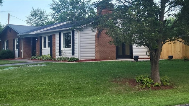 313 Farmstead Rd, King, NC 27021 - single story home with a chimney and brick siding