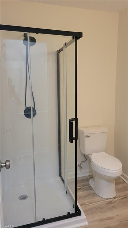 313 Farmstead Rd, King, NC 27021 - full bath featuring wood finished floors and a stall shower