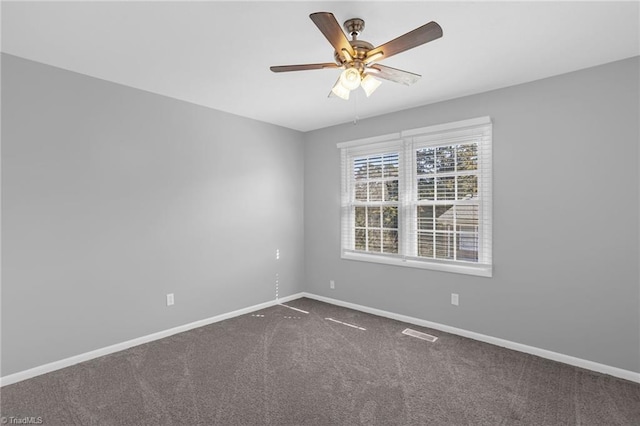 carpeted empty room with ceiling fan