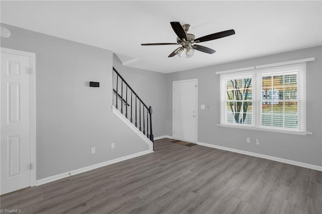 foyer featuring hardwood / wood-style flooring and ceiling fan