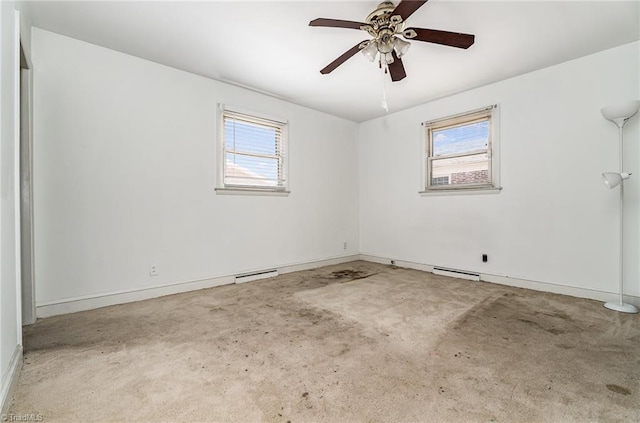 2110 E Green Dr, High Point, NC 27260 - unfurnished room with baseboards, ceiling fan, and carpet floors
