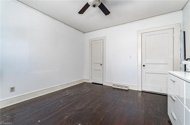2110 E Green Dr, High Point, NC 27260 - unfurnished room with baseboards, visible vents, wood finished floors, and a ceiling fan
