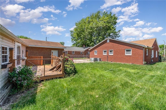 2110 E Green Dr, High Point, NC 27260 - view of yard featuring a deck and cooling unit