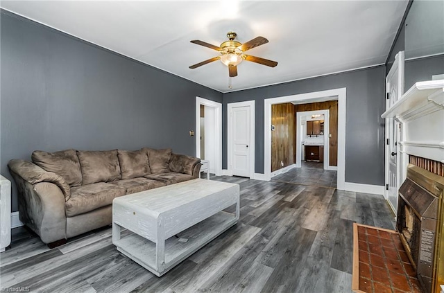 2110 E Green Dr, High Point, NC 27260 - living area featuring ceiling fan, baseboards, and dark wood-style floors