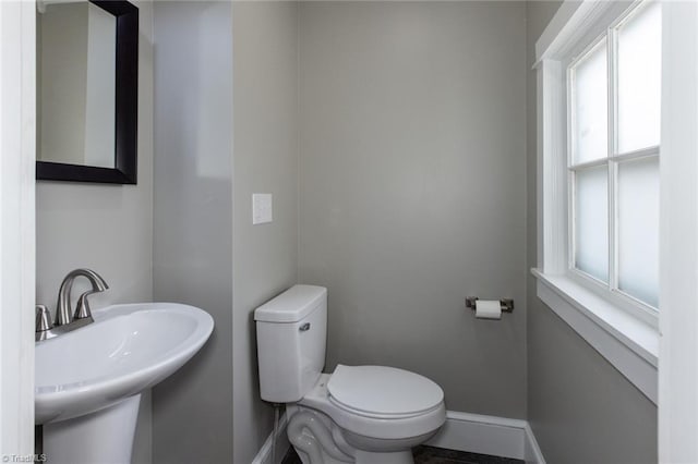 bathroom with sink and toilet