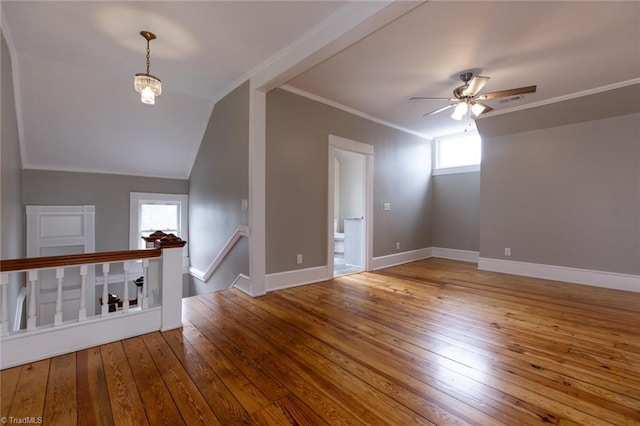 bonus room featuring lofted ceiling, hardwood / wood-style floors, and ceiling fan