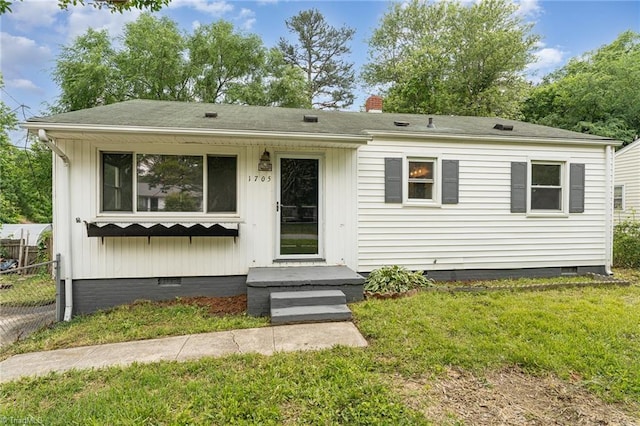 1705 Boyden St, Greensboro, NC 27403 - view of front of home featuring crawl space and a chimney
