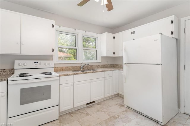 1705 Boyden St, Greensboro, NC 27403 - kitchen with white appliances, a sink, white cabinetry, and a ceiling fan