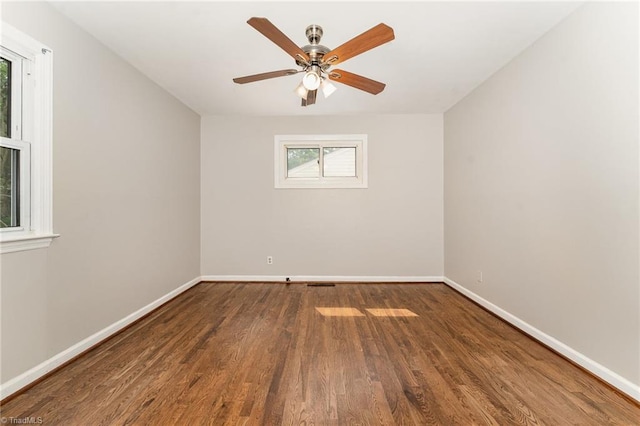 1705 Boyden St, Greensboro, NC 27403 - empty room with wood finished floors, baseboards, and a ceiling fan