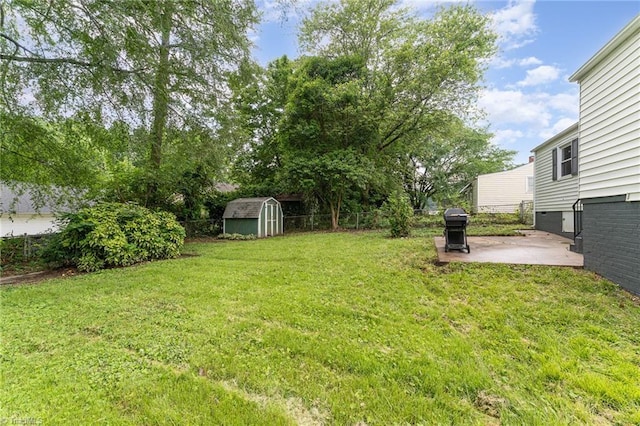 1705 Boyden St, Greensboro, NC 27403 - view of yard with a patio area, a shed, and an outdoor structure
