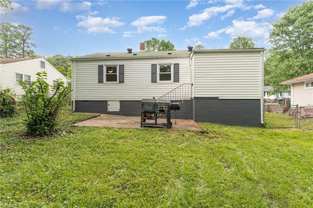 1705 Boyden St, Greensboro, NC 27403 - back of property with a patio area and crawl space