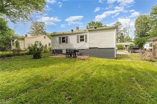 1705 Boyden St, Greensboro, NC 27403 - rear view of property featuring a patio area, a gate, and entry steps