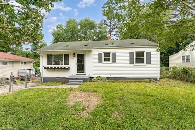 1705 Boyden St, Greensboro, NC 27403 - view of front of home with crawl space, a chimney, and a shingled roof