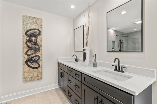 135 Boxwood Cir, Advance, NC 27006 - full bathroom with double vanity, a shower, recessed lighting, baseboards, and tile patterned flooring