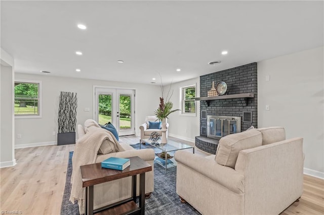 135 Boxwood Cir, Advance, NC 27006 - living area with baseboards, a fireplace, light wood-style floors, and recessed lighting