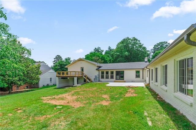 135 Boxwood Cir, Advance, NC 27006 - rear view of house with a patio area, stairs, and a yard