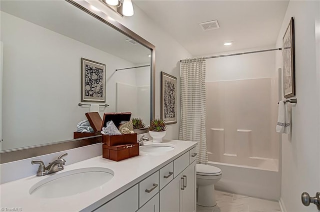 5927 Clouds Harbor Trl, Clemmons, NC 27012 - bathroom with toilet, double vanity, marble look tile flooring, shower / bath combo with shower curtain, and recessed lighting