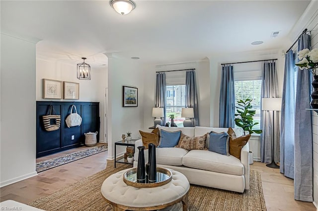 5927 Clouds Harbor Trl, Clemmons, NC 27012 - living room with a chandelier and light wood-style flooring