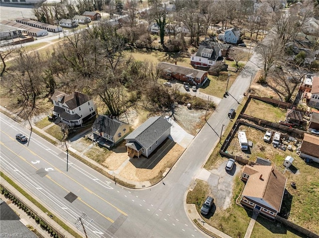 birds eye view of property with a residential view