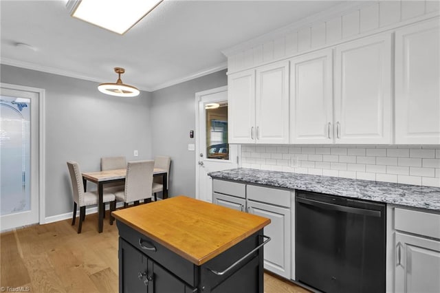 kitchen with white cabinets, dishwasher, light hardwood / wood-style floors, and crown molding