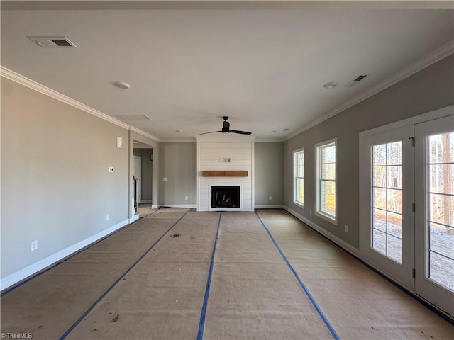 unfurnished living room with a fireplace, visible vents, ornamental molding, a ceiling fan, and baseboards