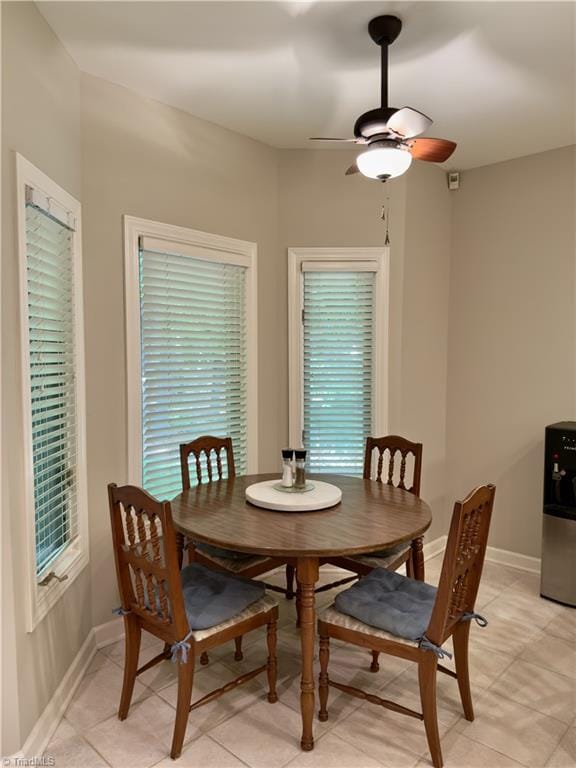 606 Dorado Cir, High Point, NC 27265 - dining space with a ceiling fan, baseboards, and light tile patterned floors