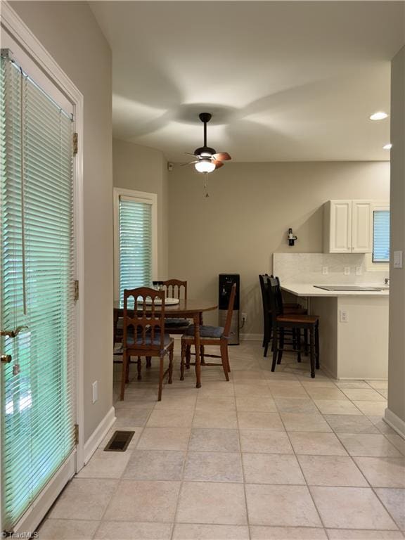 606 Dorado Cir, High Point, NC 27265 - dining space with ceiling fan, light tile patterned flooring, baseboards, and recessed lighting