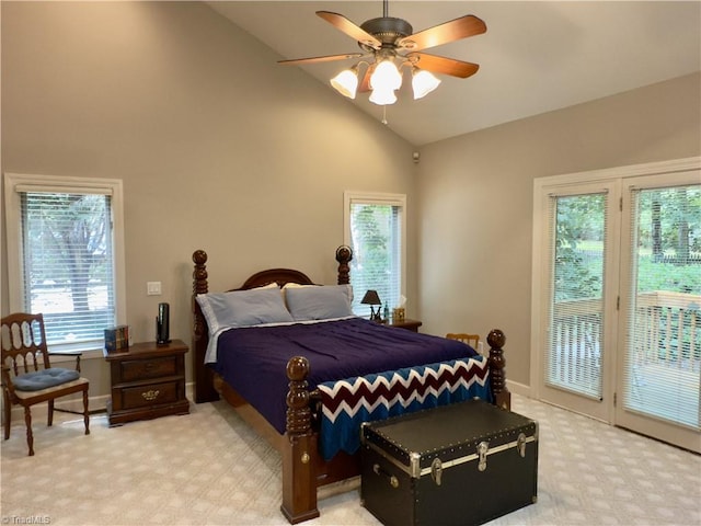 606 Dorado Cir, High Point, NC 27265 - bedroom with light colored carpet, access to exterior, multiple windows, high vaulted ceiling, and baseboards