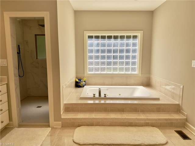 606 Dorado Cir, High Point, NC 27265 - full bath with a tub with jets, a marble finish shower, and tile patterned flooring