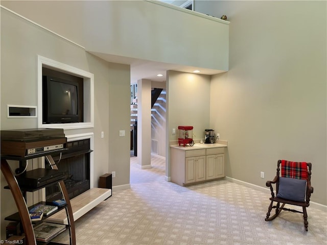 606 Dorado Cir, High Point, NC 27265 - sitting room with baseboards and light carpet