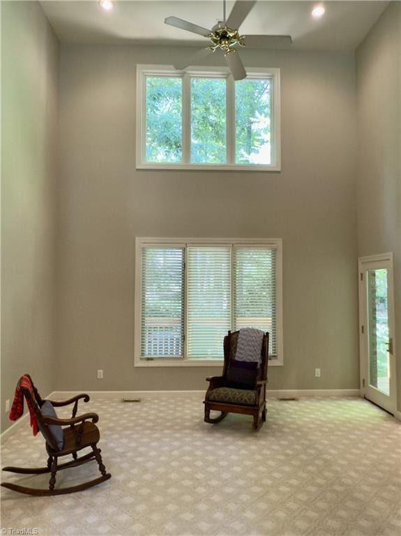 606 Dorado Cir, High Point, NC 27265 - living area featuring carpet flooring, ceiling fan, a towering ceiling, recessed lighting, and baseboards