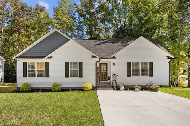 single story home with a front lawn