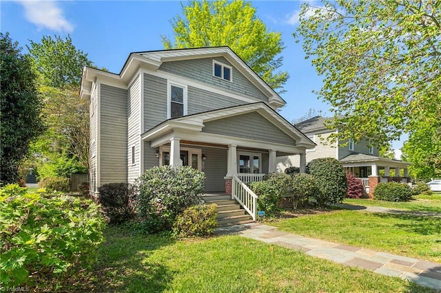 104 E Wilson St, Mebane, NC 27302 - american foursquare style home with covered porch and a front yard