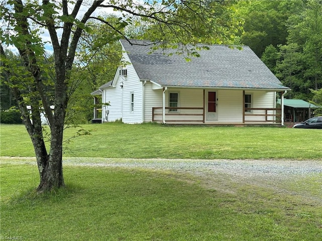 813 Blevins Store Rd, Mount Airy, NC 27030 - view of front of house featuring roof with shingles, a porch, a front lawn, and driveway