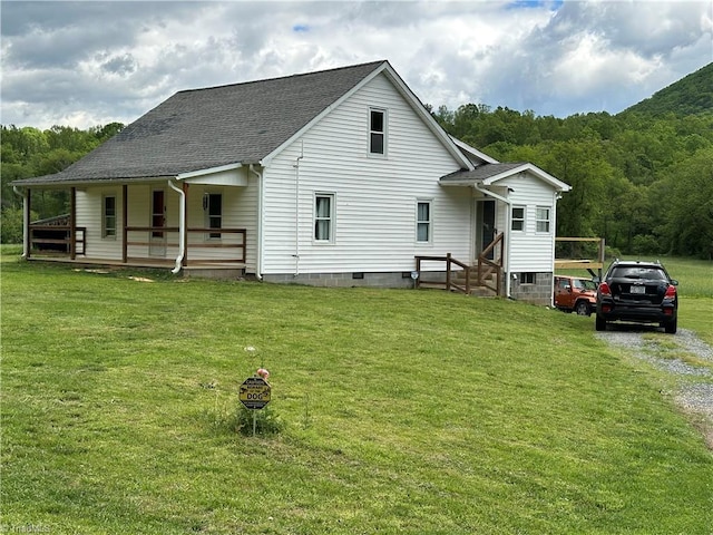 813 Blevins Store Rd, Mount Airy, NC 27030 - rear view of property with a shingled roof, a yard, and a view of trees
