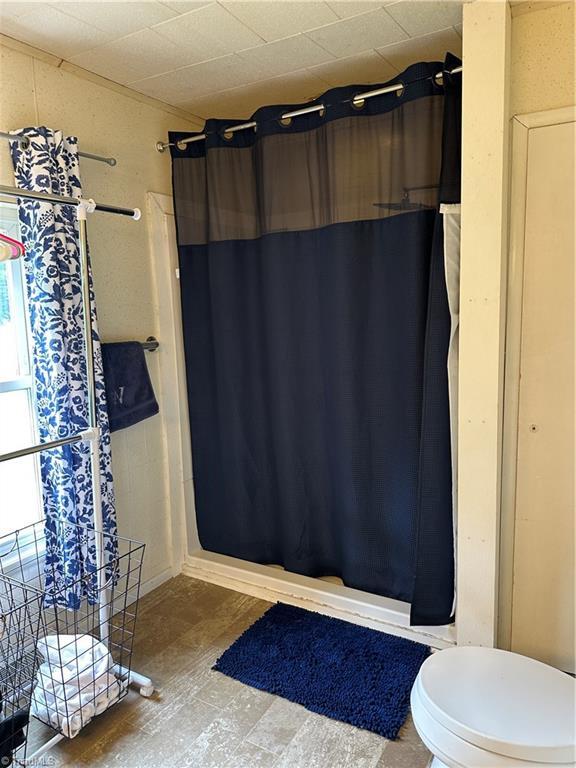 813 Blevins Store Rd, Mount Airy, NC 27030 - full bath featuring a stall shower and toilet