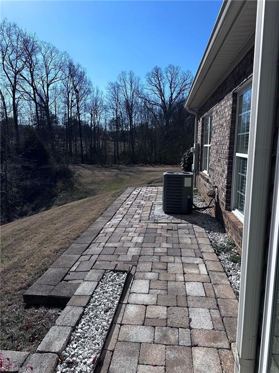 view of patio with central AC