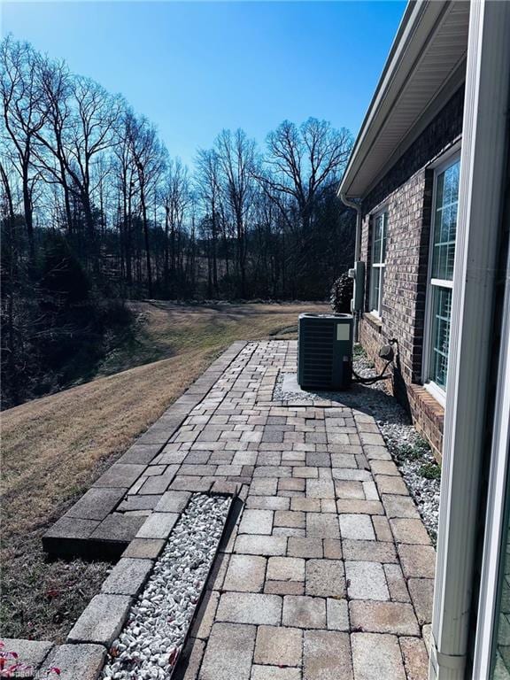 view of patio / terrace featuring central air condition unit