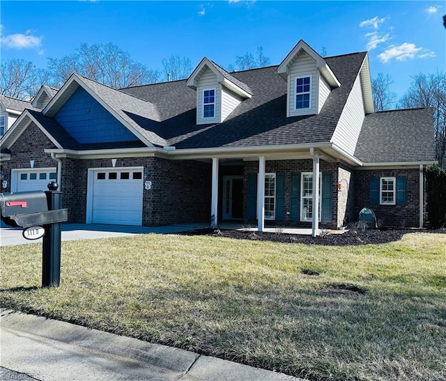 view of front of home with covered porch and a front yard