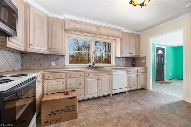 753 Wolf Island Rd, Reidsville, NC 27320 - kitchen with ornamental molding, sink, light brown cabinets, and white appliances