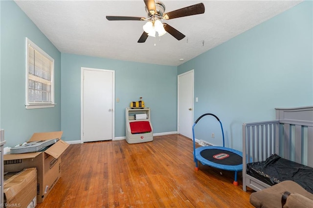 753 Wolf Island Rd, Reidsville, NC 27320 - bedroom with hardwood / wood-style floors and ceiling fan