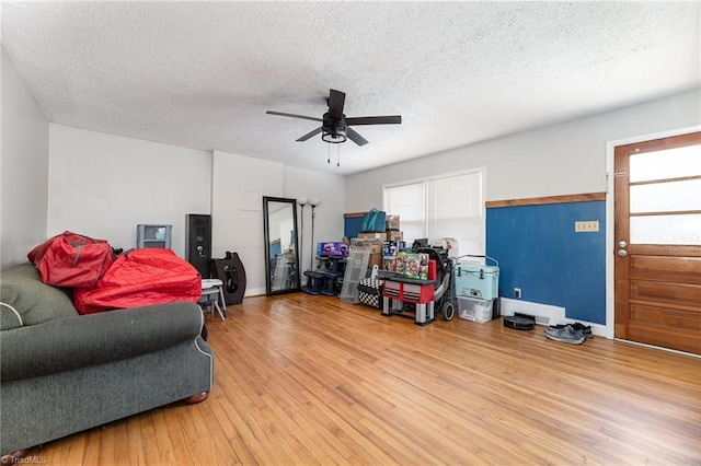 753 Wolf Island Rd, Reidsville, NC 27320 - living room featuring hardwood / wood-style floors, a textured ceiling, and ceiling fan