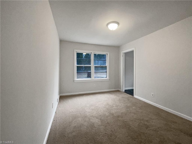 empty room featuring carpet flooring