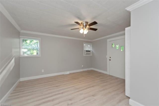 712 Englewood St, Greensboro, NC 27403 - empty room with light wood-style flooring, ceiling fan, ornamental molding, and baseboards