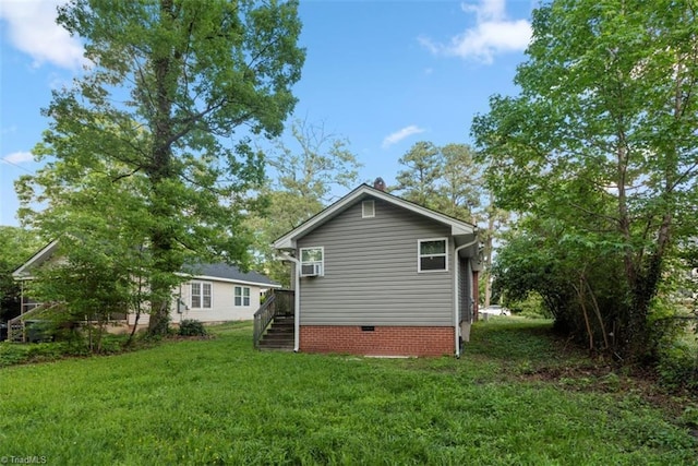 712 Englewood St, Greensboro, NC 27403 - rear view of house with crawl space and a yard