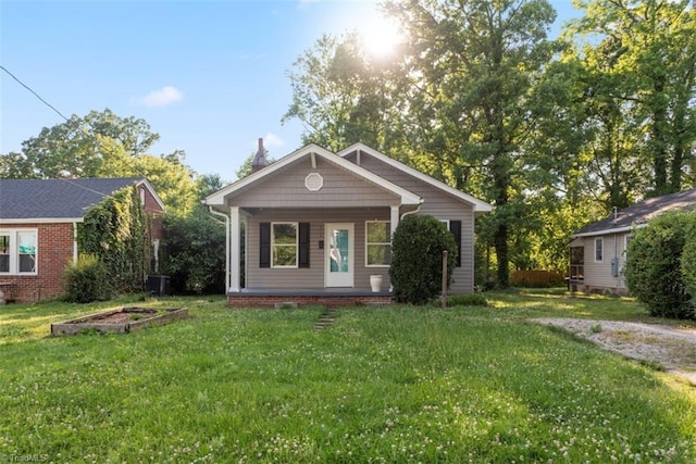 712 Englewood St, Greensboro, NC 27403 - view of outdoor structure with covered porch and cooling unit
