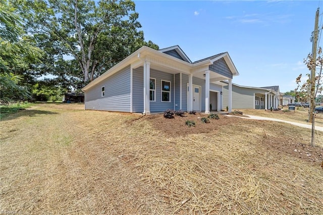 3145 Chapel St, Walkertown, NC 27051 - ranch-style home with an attached garage and a porch