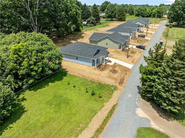 3145 Chapel St, Walkertown, NC 27051 - aerial view of property and surrounding area with a tree filled landscape