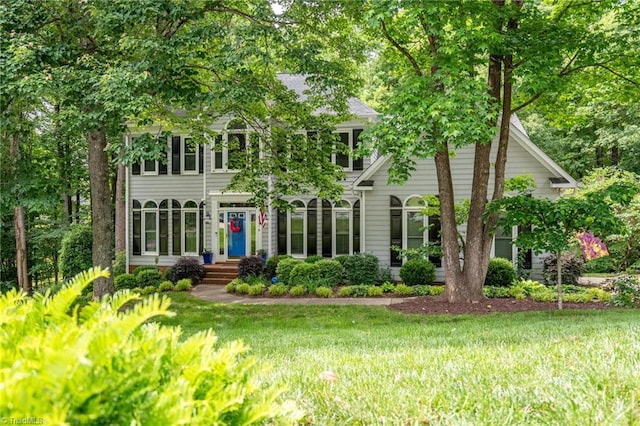 6516 Dornoch Dr, Greensboro, NC 27410 - view of front of house with a front yard