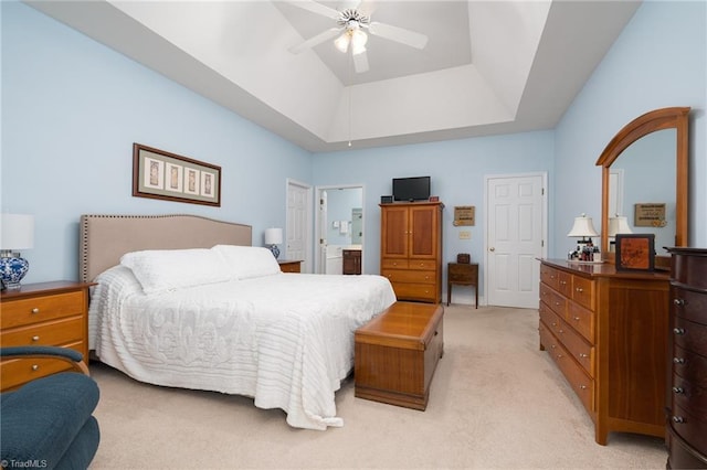 6516 Dornoch Dr, Greensboro, NC 27410 - bedroom with light colored carpet, a raised ceiling, ensuite bath, and ceiling fan